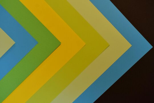 Abstract chevron pattern with blue green and yellow colorful geometric design modern background
