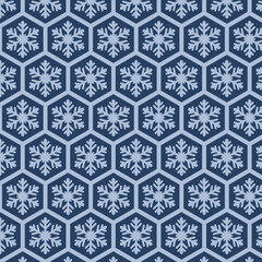 Bold blue seamless pattern with hexagonal geometric snowflakes. Ideal for winter backgrounds, wrapping paper, textiles and modern holiday design.