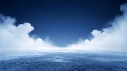 Obraz premium Vast expanse of a turbulent ocean under a dramatic cloudy blue sky at twilight