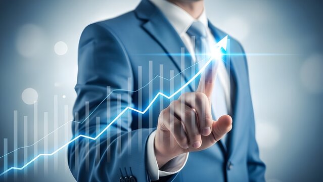 Businessman in a suit pointing to a glowing upward trending financial graph with abstract bokeh background