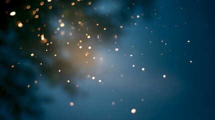 Soft glowing bokeh lights twinkle and shimmer against a deep atmospheric blue background evoking a magical and dreamy ambiance