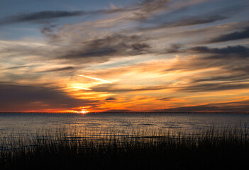 Coastal Sunset with Dramatic Clouds