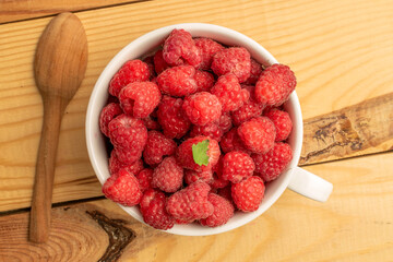 Sweet fresh raspberries, top view, macro.
