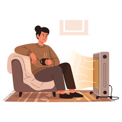 Relaxing at home with hot drink and heater on a cold winter day