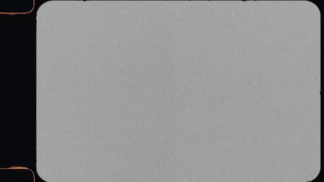 Film Grunge Overlay with 8mm Analog Celluloid, Dust, Noise, and Flicker Effects &ndash; Long Authentic Filmstrip Loop for Motion Graphics 8mm Looks