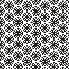 Fototapeta premium Intricate black and white geometric pattern featuring repeating starburst motifs in a hexagonal arrangement