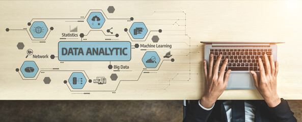 Close-up view of hands typing on a laptop in a modern office, surrounded by graphics depicting data analytic elements, big data, and machine learning concepts. Tessel