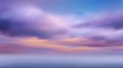 Dreamy pastel sky with soft clouds at twilight showcasing vibrant colors of purple, pink, and blue for serene and calming landscape imagery