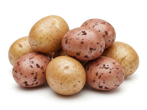 Fresh raw organic potatoes, a mix of light brown and red varieties, on white isolated on white background - Powered by Adobe