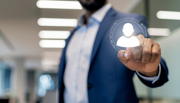 Recruitment and Selection : A professional in a blue suit points towards a digital icon representing a person. conveying themes of recruitment, selection, and the future of work.