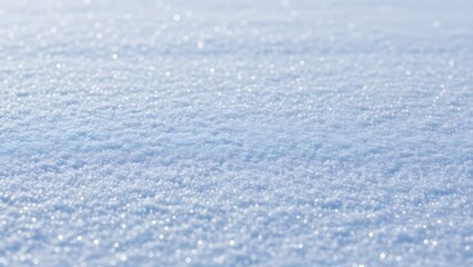 Soft white snow surface texture with subtle sparkle, cool blue tone highlights