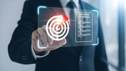 Businessman targeting digital interface with futuristic technology displaying data and information for strategic planning and success