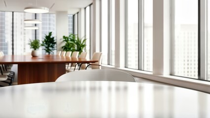 Modern office meeting room with a long wooden conference table, comfortable chairs, and large windows, ideal for professional business discussions and collaboration