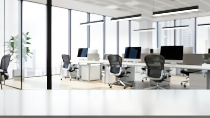 White table in the foreground with a blurred modern office interior, featuring an openplan workspace with desks, computers, chairs, and large windows, ideal for product display