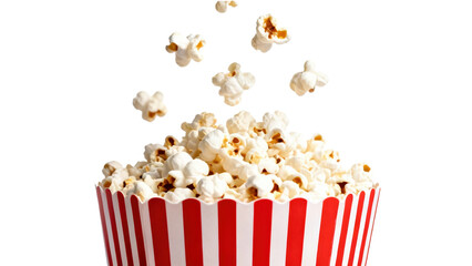Popcorn scattered in the air over a red and white striped bucket ready for a movie night at home