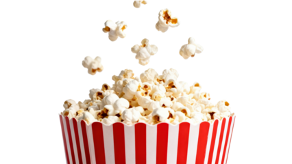 Popcorn scattered in the air over a red and white striped bucket ready for a movie night at home