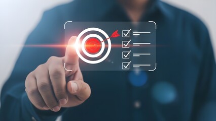Achieving goals man tapping virtual target with completed checklist