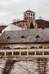 Historic Village Houses and Church Tower in Rustic European Landscape