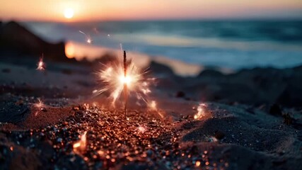 Chinese lunar new year Chunjie celebration concept. A closeup shot of a sparkler on a sandy beach during sunset. The sparkler is in the foreground, with the ocean and sky in the background.