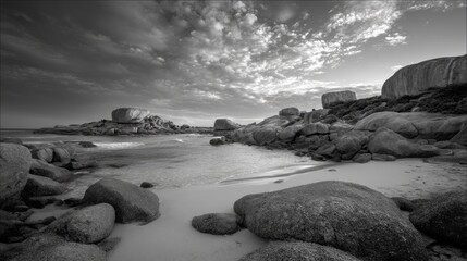 Dramatic rocky coastline in black and white with boulders and waves. AI generative