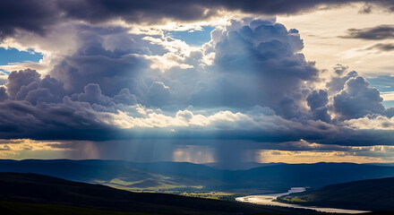 Dramatic Cumulonimbus Cloudscape With Sun Rays Breaking Through Over Distant Mountain Landscape and River, Atmospheric Weather Phenomenon