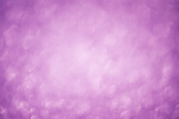 Defocus lights purple. Blurred purple background with a bright center.