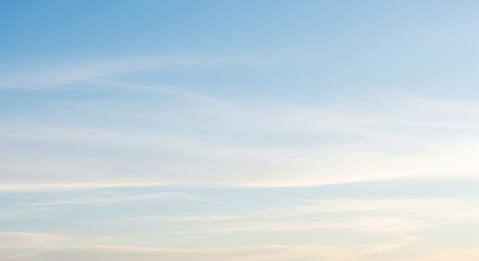 Peaceful Clear Sky Featuring Light White Cirrus Clouds Set Against Pale Blue Backdrop Showing Simple Beauty Of Nature And Peaceful Daybreak