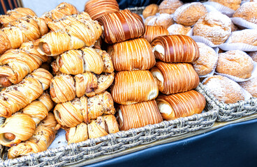 Appetizing pies with various fillings ready for sale