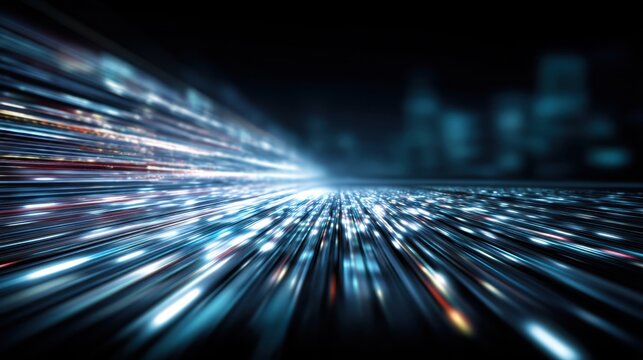 Bright streaks of light create a sense of speed and energy in a city at night. The urban landscape is blurred showcasing vibrant colors and an active atmosphere.