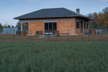 Obraz premium Construction of a single-family house made of red ceramic blocks.