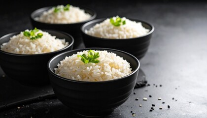 Steaming Rice in Black Bowls Simple and Elegant Presentation for Wellness and Healthy Eating Concepts.