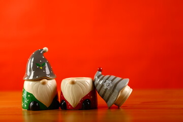 Christmas gnomes arranged together with spruce creating a warm festive scene