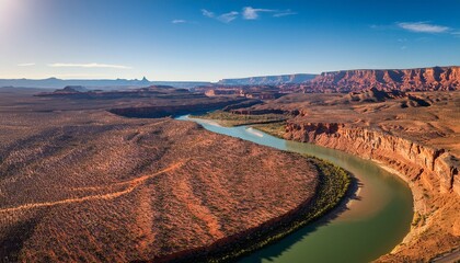 Aerial View Of The Fish River In An Arid Landscape Showing A Winding Path Through A Canyon And Distant Mountains