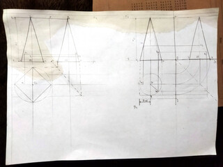 Detailed technical drawing of geometric shapes on paper