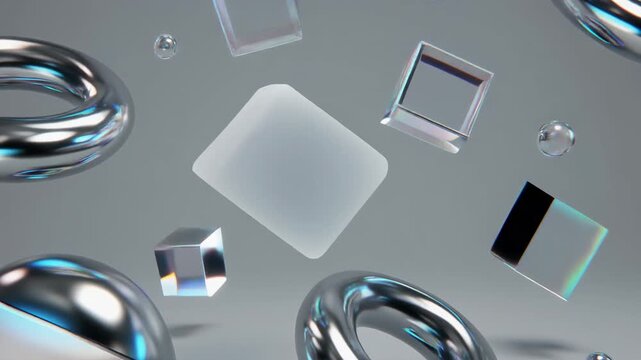 Seamless Loop of Floating Chrome Torus and Prismatic Glass Cubes with Central Copy Space Perfect background for logo reveal, product presentation, or overlaying text