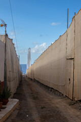 Dusty road and Lighthouse Punta del Hilgado, Tenerife, Spain