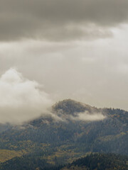Misty Autumn Rain Clouds over Ukrainian Carpathian Mountains.