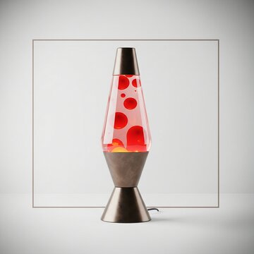 Bronze lava lamp (metallic wax), antique-like glow, centered in a minimalist white room with a subtle square frame, emphasizing texture and the modern and ambient aesthetic. Vignet