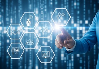 Businessman touching a digital interface with business icons