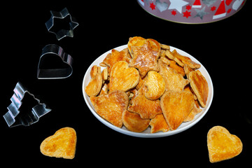 biscuits de No&euml;l pr&eacute;sent&eacute; sur fond noir
