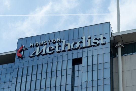 Houston, Texas, USA - April 15, 2024: Houston Methodist close up sign on the building in Houston, Texas, USA. Houston Methodist is an academic medical center.