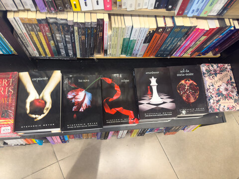 BELO HORIZONTE, MG, BRAZIL &ndash; NOVEMBER, 26, 2025: Display of Twilight saga books and other titles by Stephenie Meyer and Mario Vargas Llosa on a bookstore shelf.
