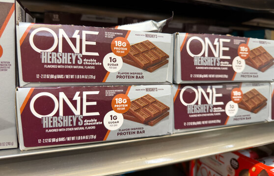 ONE Hershey&rsquo;s Double Chocolate Protein Bar Boxes on Store Shelf