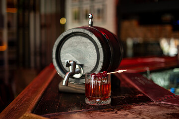 cocktail against the background of a barrel