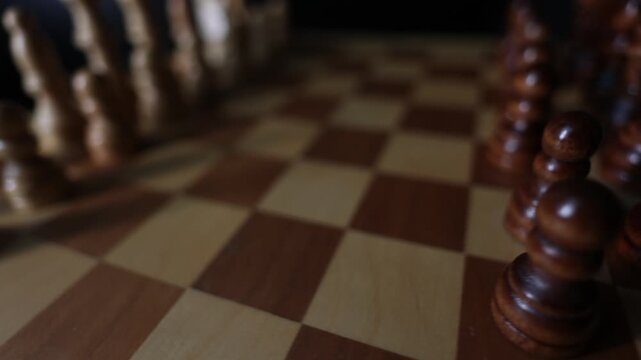 Rotating chessboard with strategically placed pieces in motion, depicting the eternal struggle between black and white factions in cerebral gameplay.
