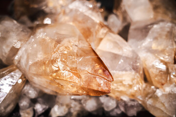 Raw citrine crystal cluster with vivid amber tones and sharp transparent facets