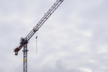 A tower crane at a building construction site