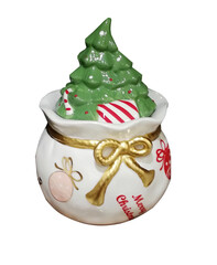 Christmas ceramic souvenir with a fir tree, isolated