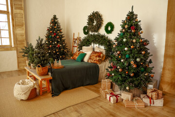 Cozy Christmas bedroom with decorated trees and wrapped gifts for holiday celebration