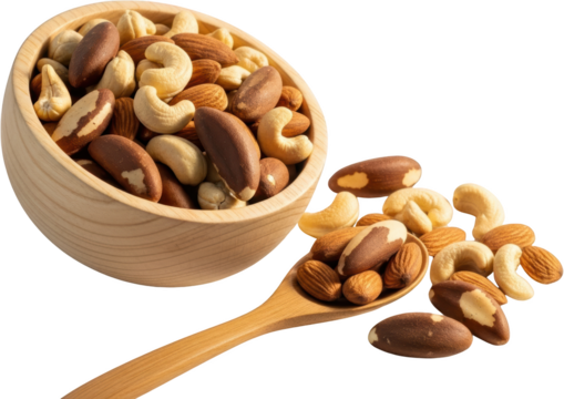 A wooden bowl overflows with a variety of healthy nuts including almonds cashews and Brazil nuts with a spoon holding more nuts snack food mixed nuts dried fruit